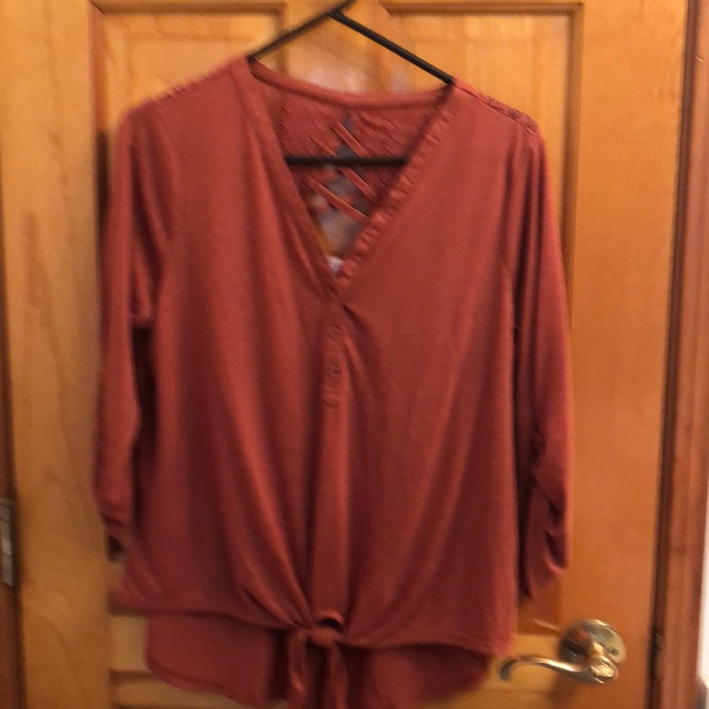 Rust colored tie knot top with lace back